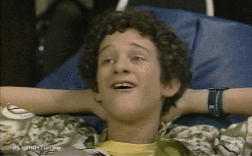 Young Man Lying in Bed