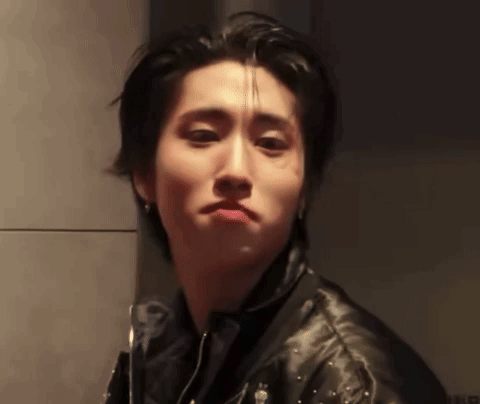Young Man Making Face In Leather Jacket GIF