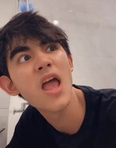 Young Man Making Funny Face GIF