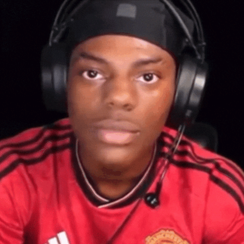 Young Man Making Funny Face With Headphones and Headband