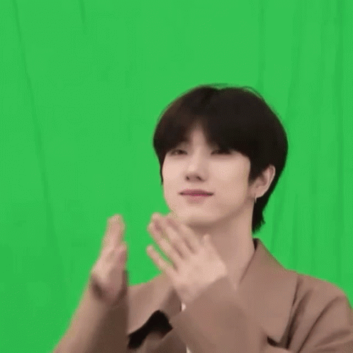 Young Man Making Heart Shape GIF