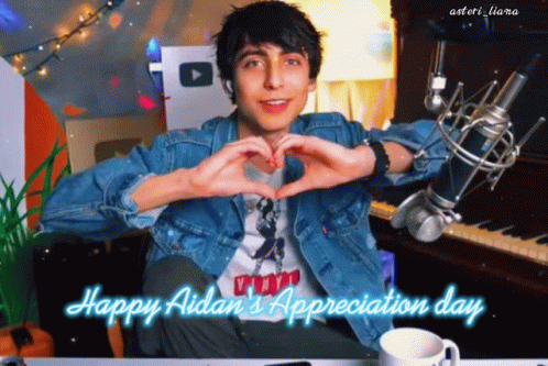 Young Man Making Heart With Hands GIF