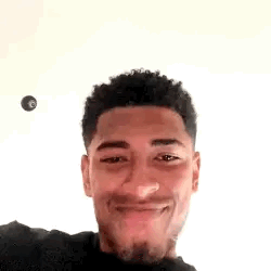 Young Man Making Peace Sign