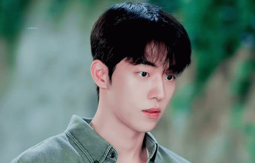 Young Man On Green Background Saying Eternity GIF