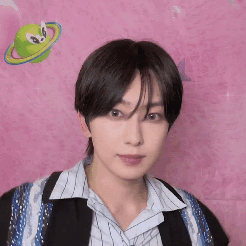 Young Man Pink Wall Green Planet