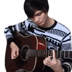 Young Man Playing Acoustic Guitar