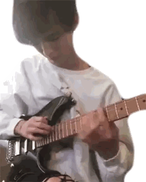 Young Man Playing Guitar