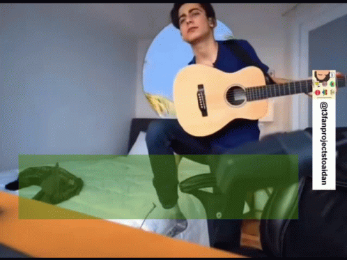 Young Man Playing Guitar @stanprojecttoidan