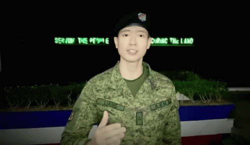 Young Man Saluting Serving People Securing Land
