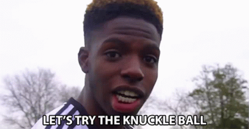 Young Man Saying Let's Try the Knuckle Ball