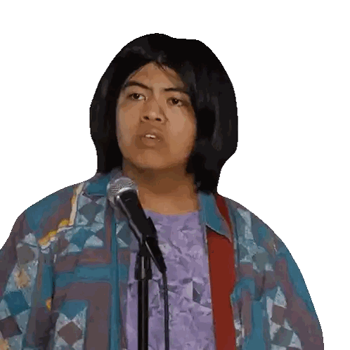 Young Man Singing Into Microphone
