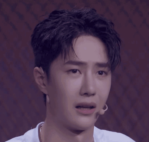 Young Man Singing Into Microphone GIF