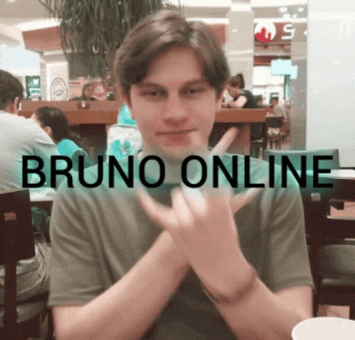 Young Man Sitting at Bruno Online Table