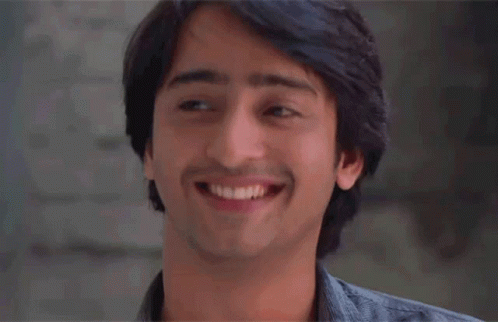 Young Man Smiling Eyes Closed