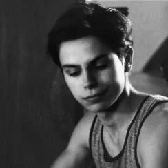 Young Man Smiling in Tank Top