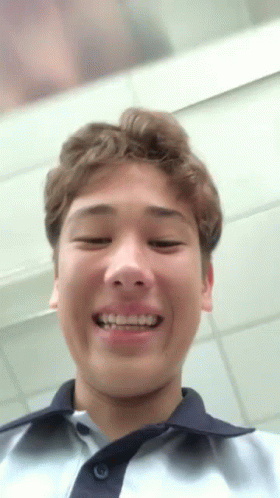 Young Man Smiling with Braces