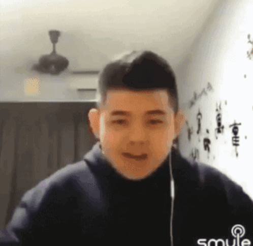 Young Man Smiling with Headphones