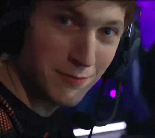 Young Man Smiling With Headphones And Microphone