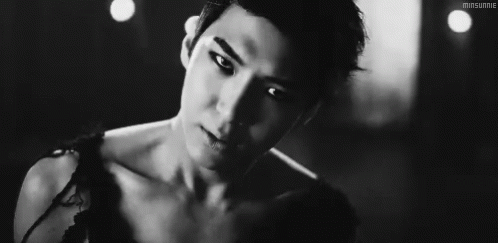 Young Man Smoking Cigarette GIF