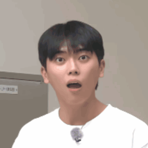 Young Man Surprised In White Shirt GIF