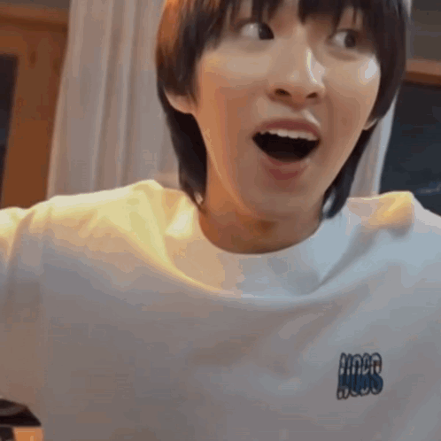 Young Man Surprised in White T-Shirt