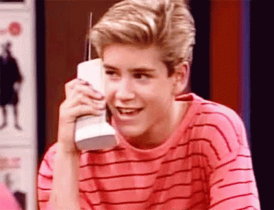 Young Man Talking on Cell Phone Smiling