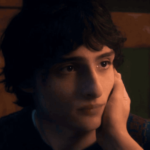 Young Man Touching Chin
