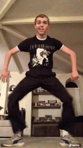 Young Man Wearing Black Shirt It S Dogs GIF