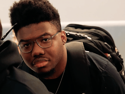 Young Man Wearing Glasses and Black Shirt