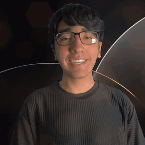 Young Man Wearing Glasses and Black Shirt Saying Adrian