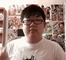 Young Man Wearing Glasses and White T-Shirt