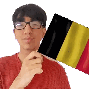 Young Man Wearing Glasses Holding Flag