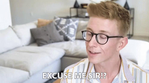 Young Man Wearing Glasses Saying Excuse Me