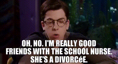 Young Man Wearing Glasses Talking to Woman