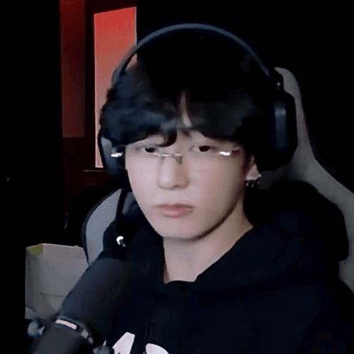 Young Man Wearing Headphones And Glasses GIF