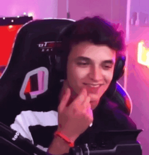 Young Man Wearing Headphones Making Funny Face GIF