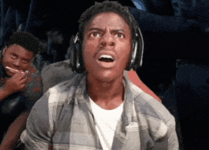 Young Man Wearing Headphones Surprised