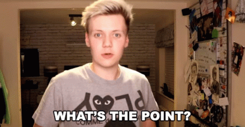 Young Man Wearing Shirt Saying What's the Point