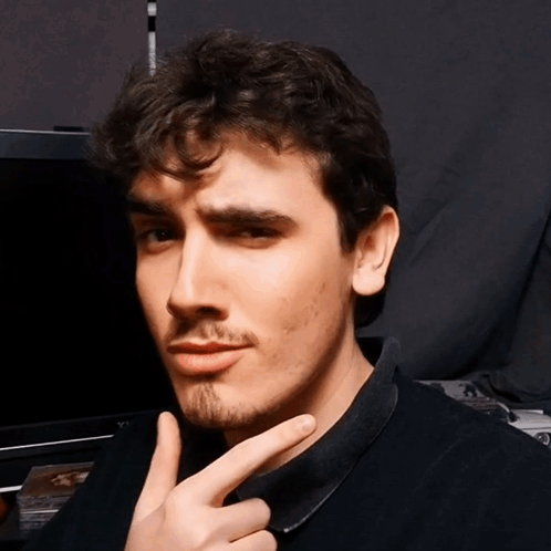 Young Man With Beard Making Funny Face GIF