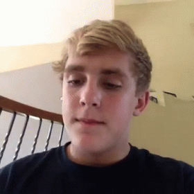 Young Man with Blonde Hair Making Funny Face
