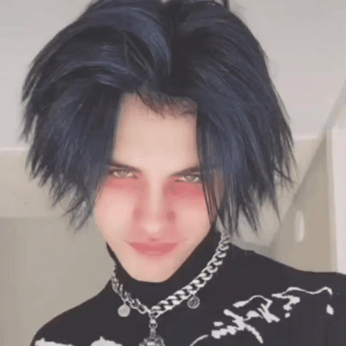 Young Man With Blue Hair in Black Turtleneck and Silver Chain