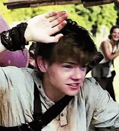 Young Man With Bracelet Touched By Hand GIF