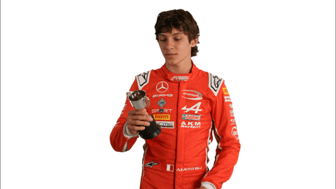 Young Man With Curly Hair Making Funny Face Saying It's Boring