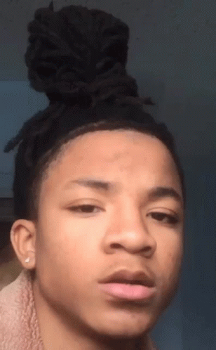 Young Man with Dreadlocks and Bun