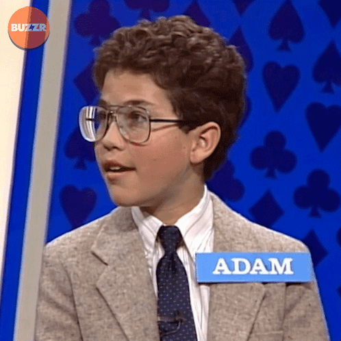 Young Man with Glasses and Adam Name Tag