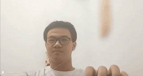 Young Man With Glasses and Earbuds on Video Call With Steven Oscar