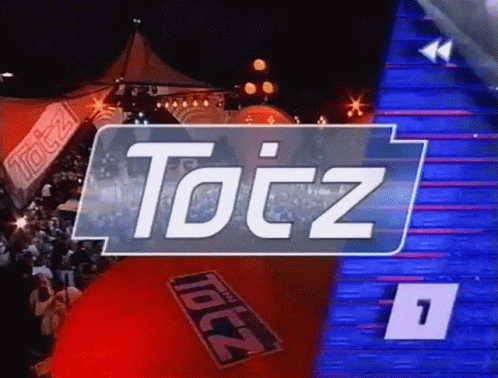 Young Man With Headband and Necklace Sitting
