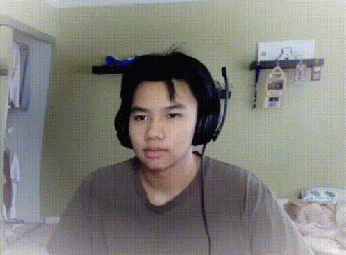 Young Man With Headphones And Microphone GIF