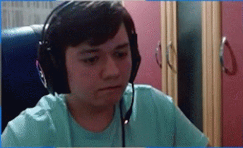 Young Man With Headphones And Microphone Sitting GIF