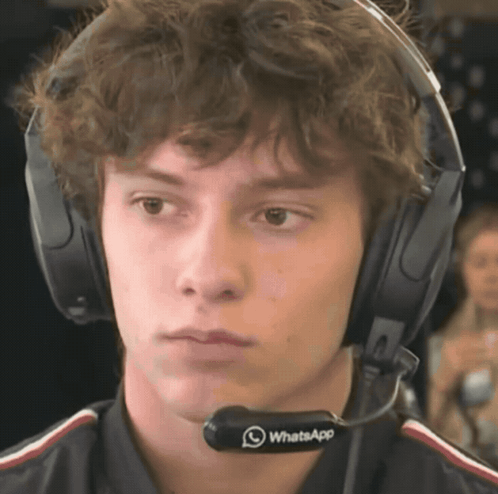 Young Man with Headphones and Whatsapp Headset